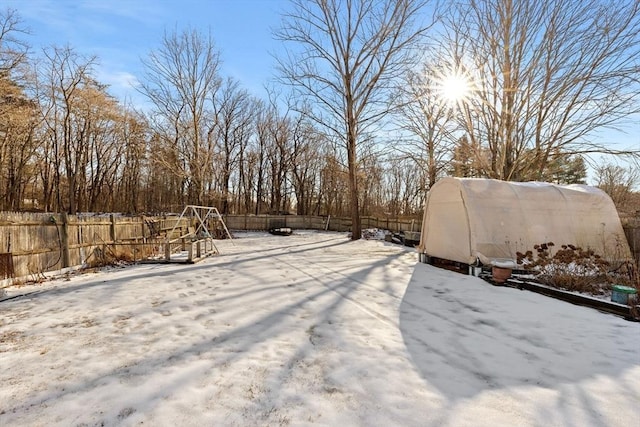 view of yard covered in snow