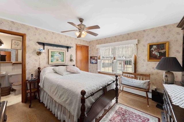 bedroom with a ceiling fan and wallpapered walls