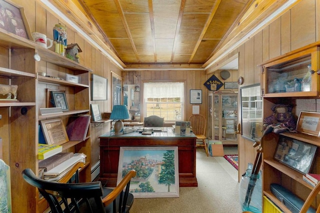 home office with carpet, wooden ceiling, wooden walls, and baseboard heating