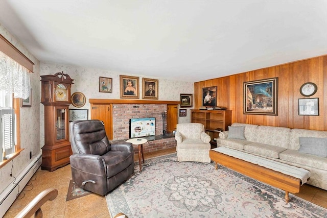 living area featuring wallpapered walls, a fireplace, and a baseboard heating unit