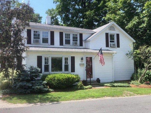 view of front of house with cooling unit