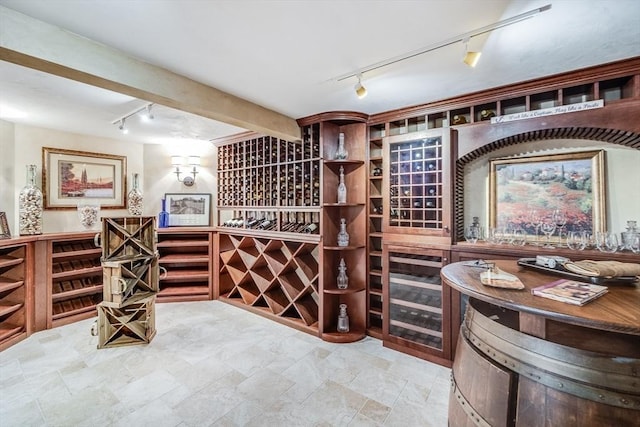 11 Teal Cir, Mashpee, MA 02649 - wine room with track lighting and stone finish flooring