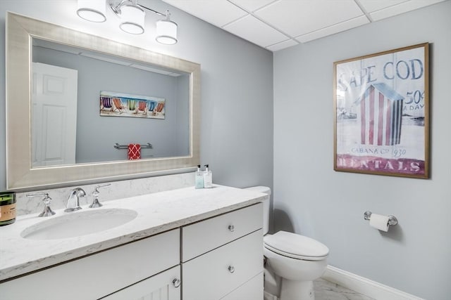 11 Teal Cir, Mashpee, MA 02649 - bathroom featuring vanity, marble finish floors, and a paneled ceiling