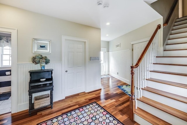 11 Teal Cir, Mashpee, MA 02649 - entrance foyer featuring wood finished floors, a wainscoted wall, stairway, and recessed lighting