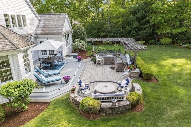 11 Teal Cir, Mashpee, MA 02649 - deck with outdoor dining area, a yard, a pergola, and a patio
