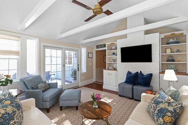 living room with hardwood / wood-style floors, built in features, lofted ceiling with beams, and ceiling fan