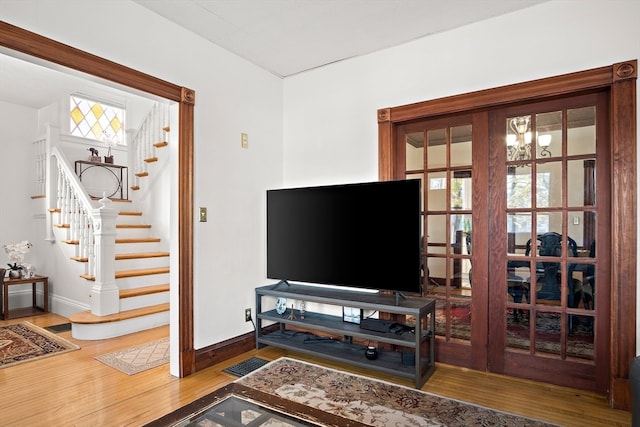 living room with a wealth of natural light and hardwood / wood-style floors