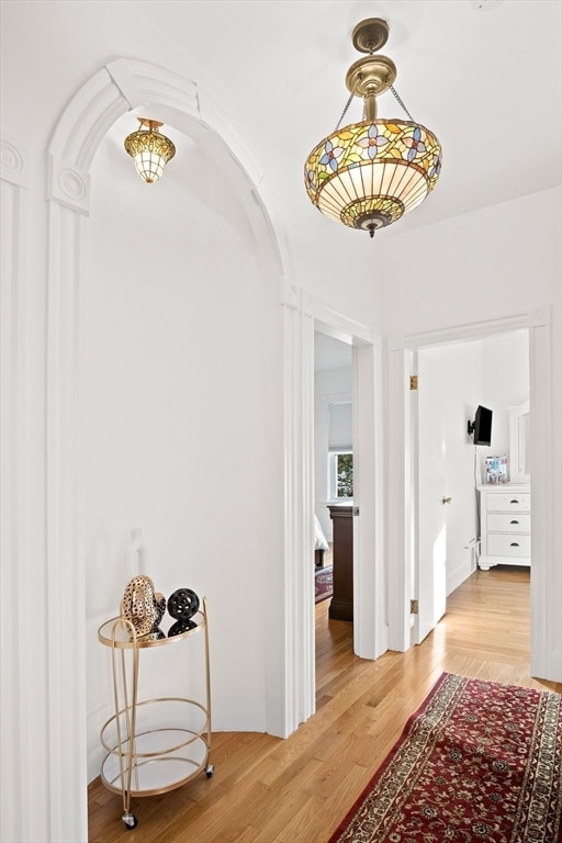 hallway featuring hardwood / wood-style flooring