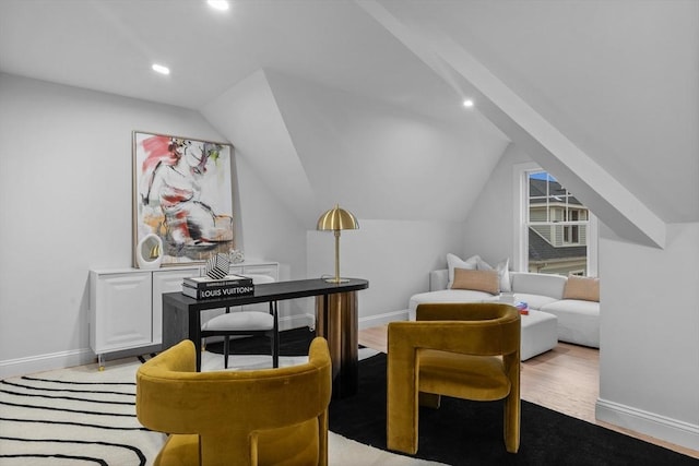 sitting room featuring vaulted ceiling and light hardwood / wood-style flooring