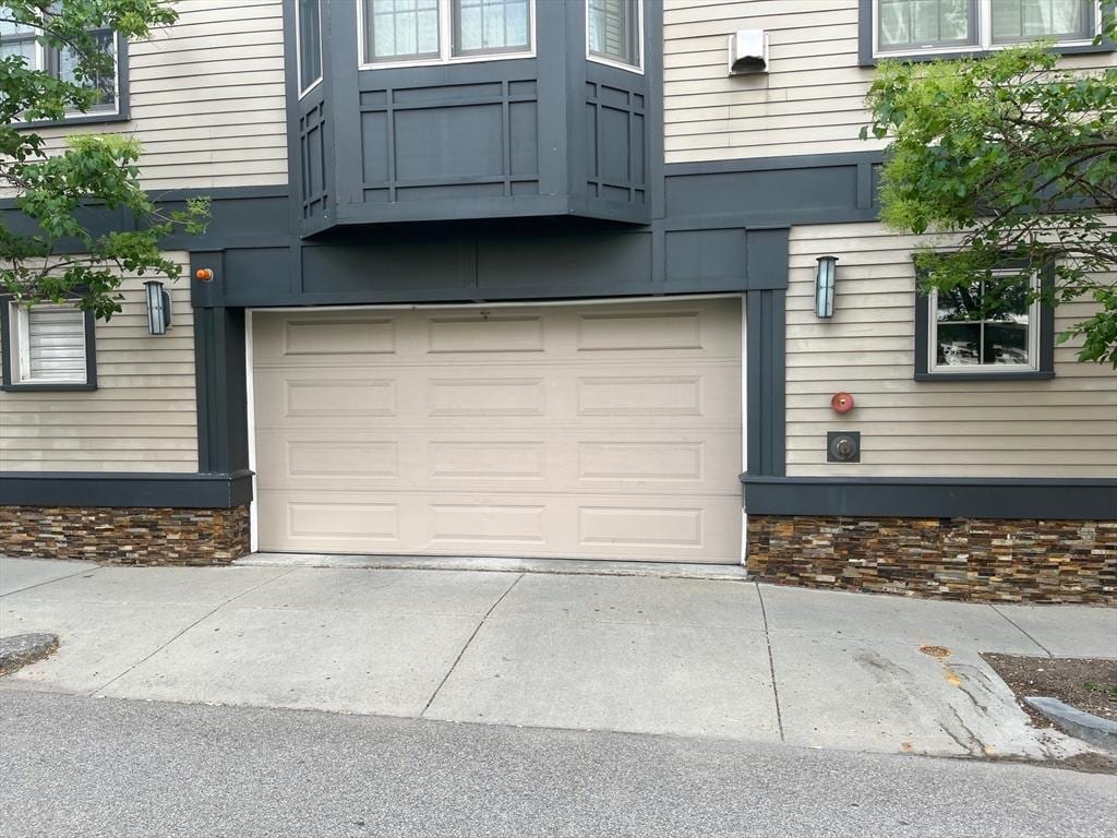191 K St Unit Parking 7, Boston, MA 02127 - garage with concrete driveway