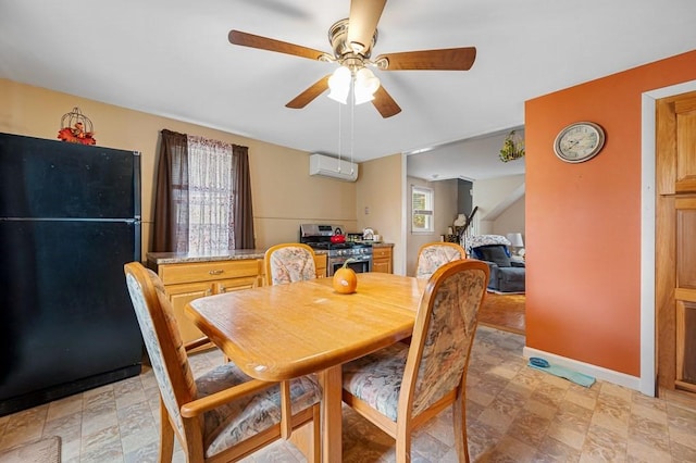 dining room featuring a wall mounted air conditioner, ceiling fan, and baseboards