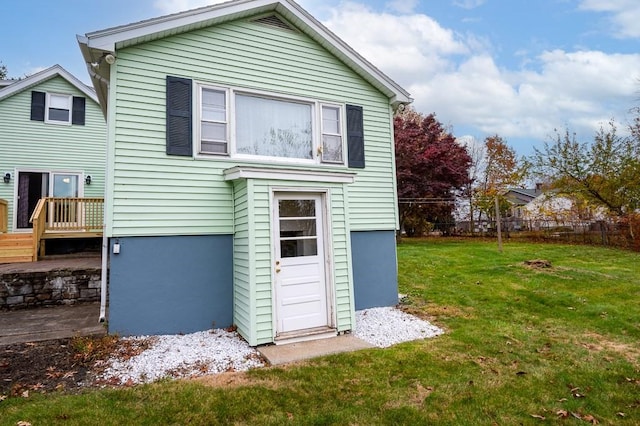 exterior space with a yard and fence