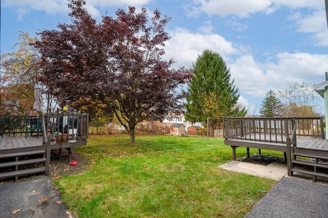 view of yard featuring a deck