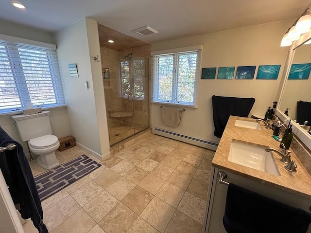 150 Sagamore St, Hamilton, MA 01982 - full bathroom with a baseboard heating unit, plenty of natural light, a stall shower, double vanity, and recessed lighting