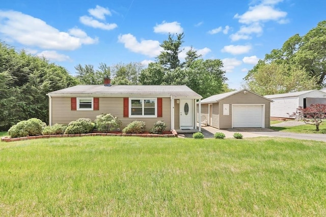 76 Regal St, Springfield, MA 01118 - single story home featuring a garage, driveway, an outbuilding, and a front yard