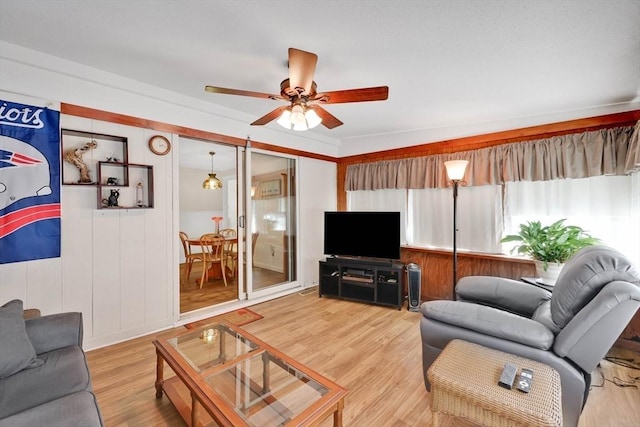 76 Regal St, Springfield, MA 01118 - living room with a ceiling fan and wood finished floors