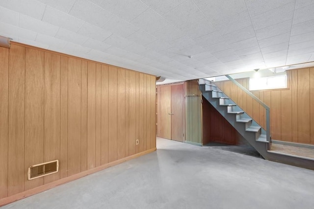 76 Regal St, Springfield, MA 01118 - below grade area featuring wooden walls and stairs
