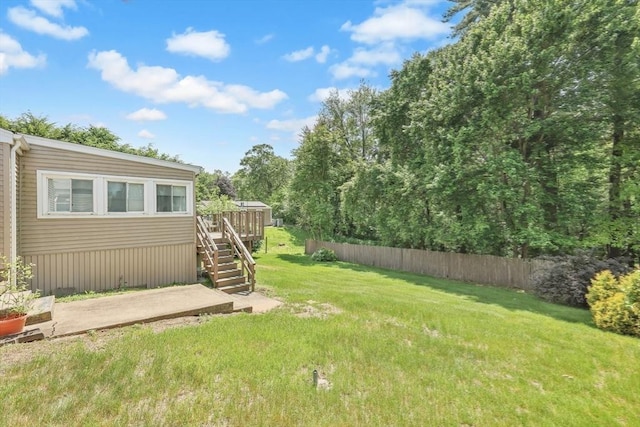 76 Regal St, Springfield, MA 01118 - view of yard with stairs, a deck, and a patio
