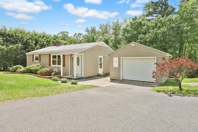 76 Regal St, Springfield, MA 01118 - ranch-style home with a garage, an outdoor structure, asphalt driveway, a front lawn, and a chimney