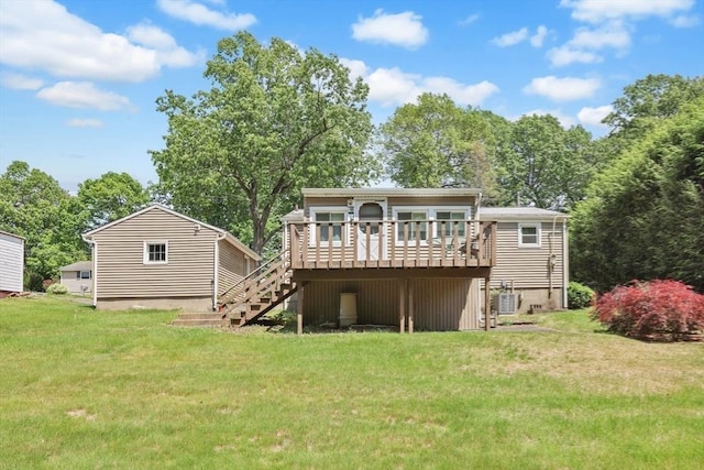 76 Regal St, Springfield, MA 01118 - rear view of house featuring a deck, stairway, a yard, and cooling unit