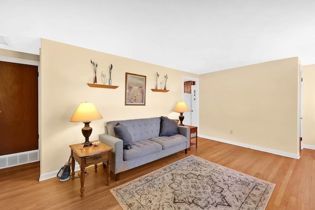 76 Regal St, Springfield, MA 01118 - living area with baseboards and light wood-style flooring