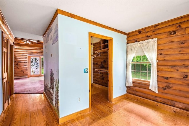 7 Hawthorne Dr, Southampton, MA 01073 - corridor featuring rustic walls and light wood finished floors
