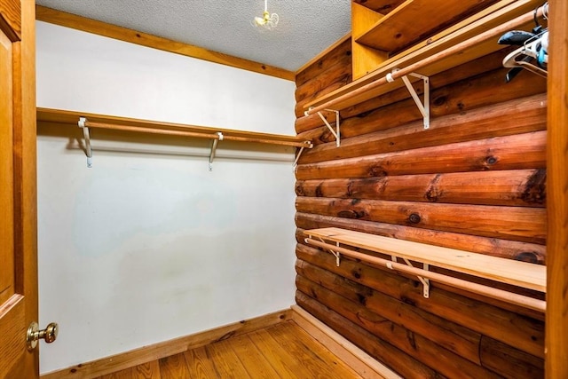 7 Hawthorne Dr, Southampton, MA 01073 - walk in closet featuring wood-type flooring