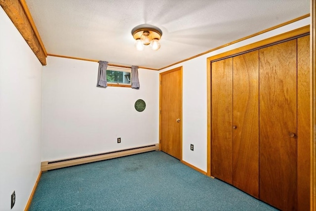 7 Hawthorne Dr, Southampton, MA 01073 - unfurnished bedroom with a baseboard radiator, carpet floors, a closet, and ornamental molding