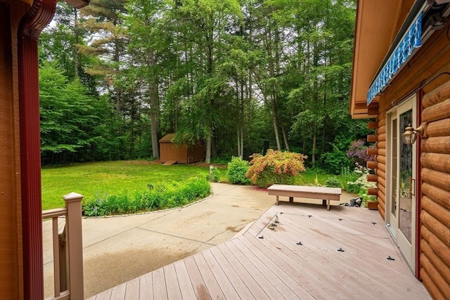 7 Hawthorne Dr, Southampton, MA 01073 - wooden terrace with a storage unit, a yard, view of scattered trees, and a patio