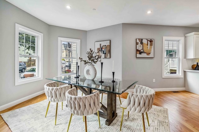 dining room featuring light hardwood / wood-style floors