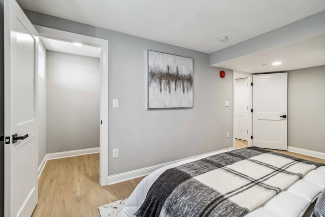 bedroom featuring light wood-type flooring