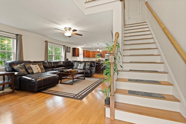 37 Leach Ave, Brockton, MA 02301 - living area featuring stairs, ceiling fan, and light wood-type flooring