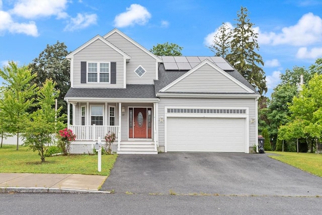 37 Leach Ave, Brockton, MA 02301 - traditional-style house with a porch, asphalt driveway, a garage, a front yard, and roof mounted solar panels