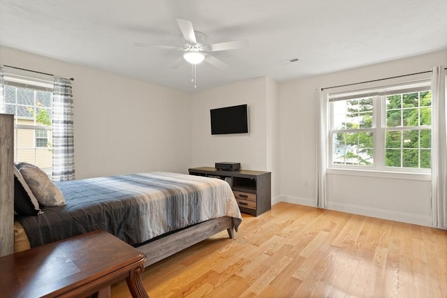 37 Leach Ave, Brockton, MA 02301 - bedroom with multiple windows, light wood-style floors, and ceiling fan