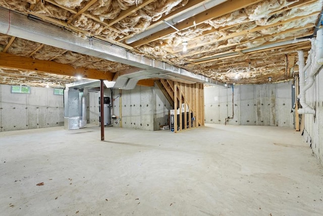 37 Leach Ave, Brockton, MA 02301 - unfinished basement with heating unit and water heater