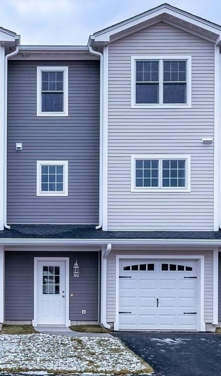 view of property with a garage