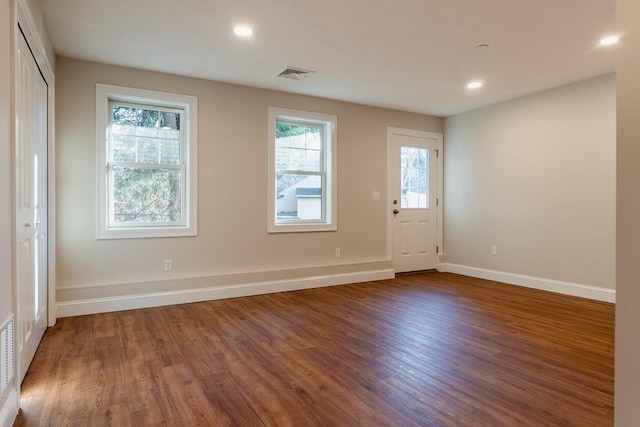 foyer entrance featuring dark hardwood / wood-style flooring