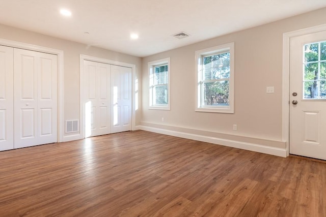 entrance foyer with hardwood / wood-style floors