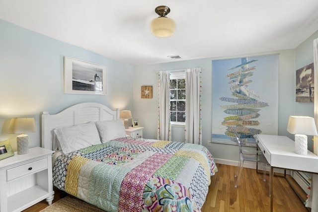 bedroom featuring hardwood / wood-style floors