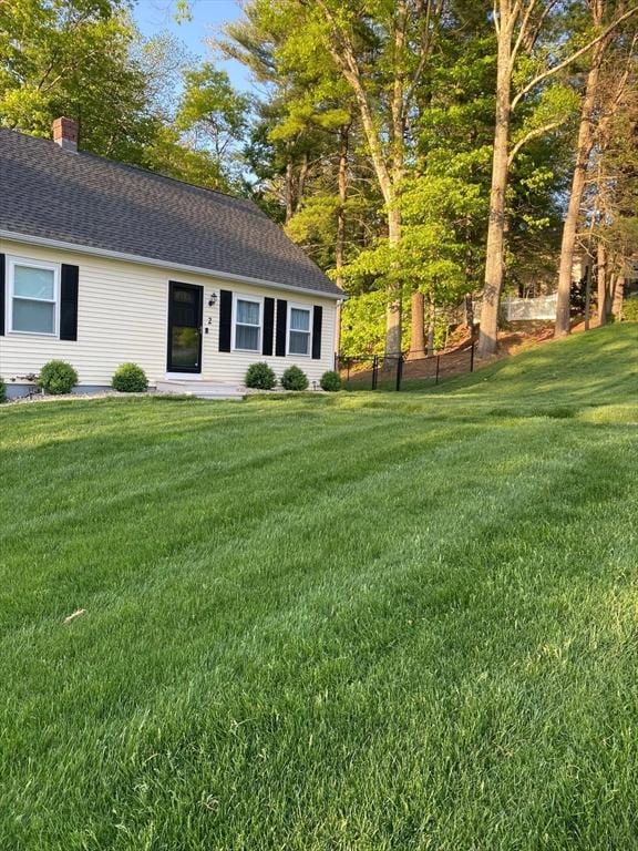 exterior space with a front lawn