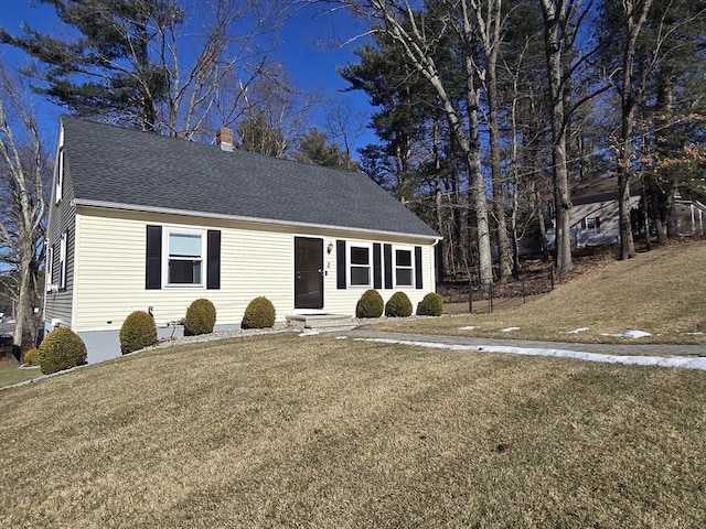 view of front of property with a front lawn