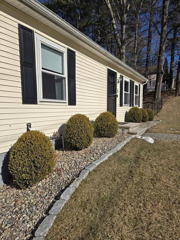 exterior space with a lawn