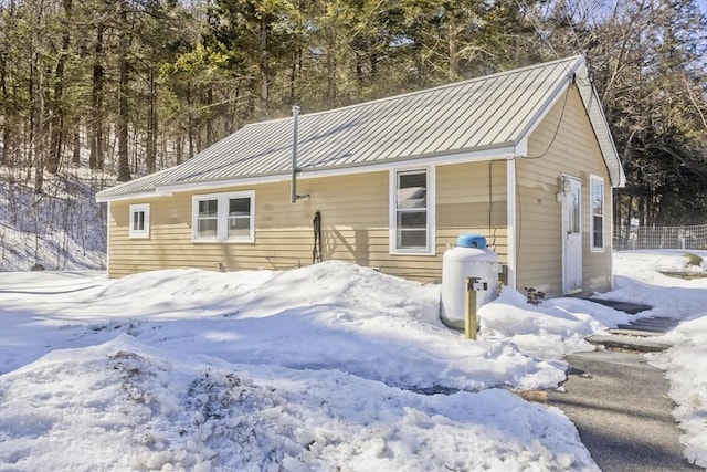 exterior space featuring metal roof and a standing seam roof