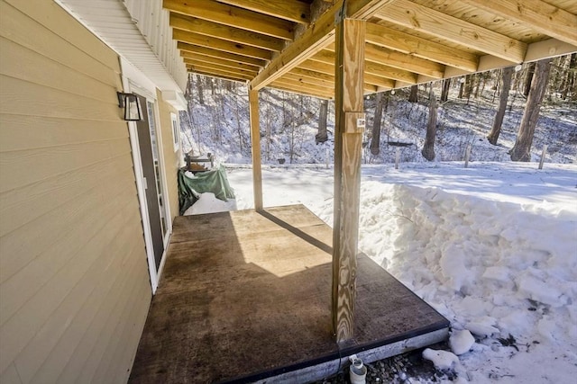 view of snow covered patio