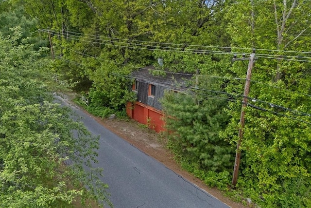 228 Old Littleton Rd, Harvard, MA 01451 - view of side of property featuring a view of trees