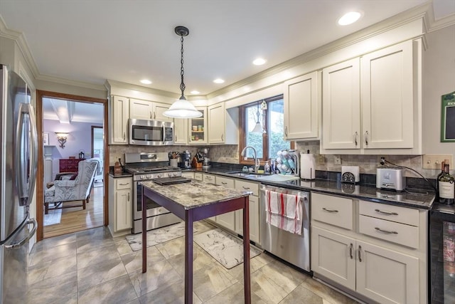 kitchen featuring a sink, stainless steel appliances, decorative backsplash, ornamental molding, and wine cooler