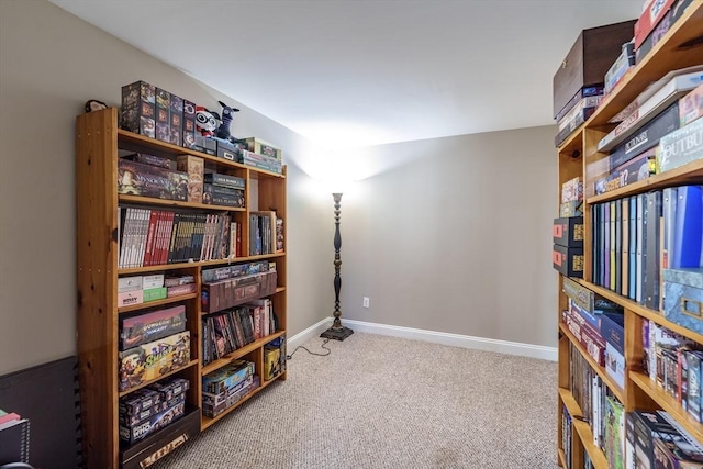 sitting room with carpet flooring and baseboards