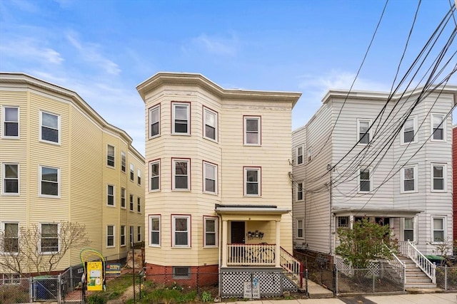 view of building exterior featuring fence private yard