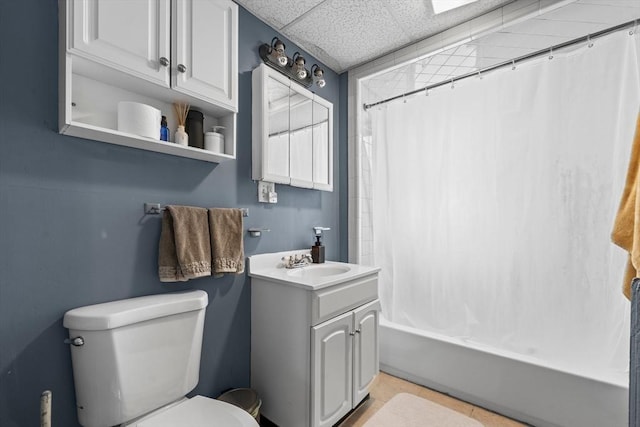 bathroom featuring vanity, shower / tub combo, tile patterned flooring, and toilet