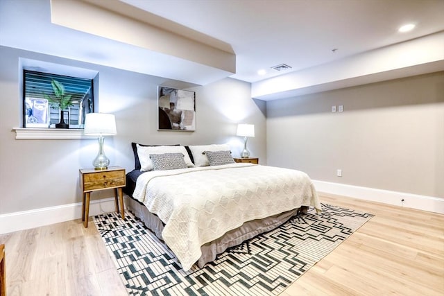 bedroom with light hardwood / wood-style flooring